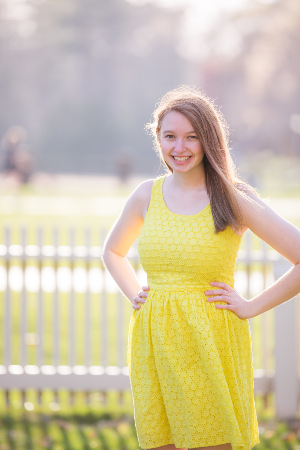 yellow dress with sunlight for senior portraits at William and Mary