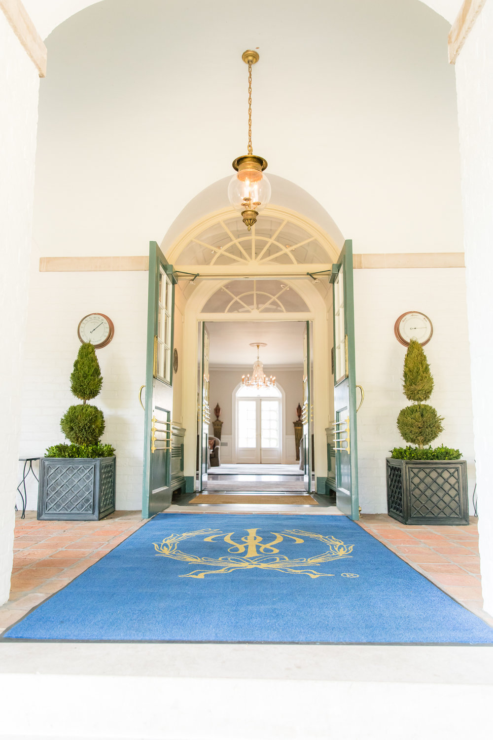 Regal entrance to the stunning hotel for your intimate wedding at the Williamsburg Inn