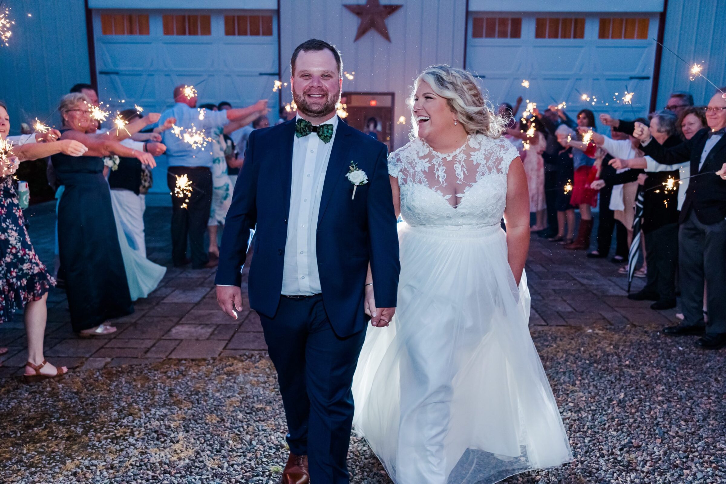 Bride and groom emerging from sparkler exit after their wedding in Virginia