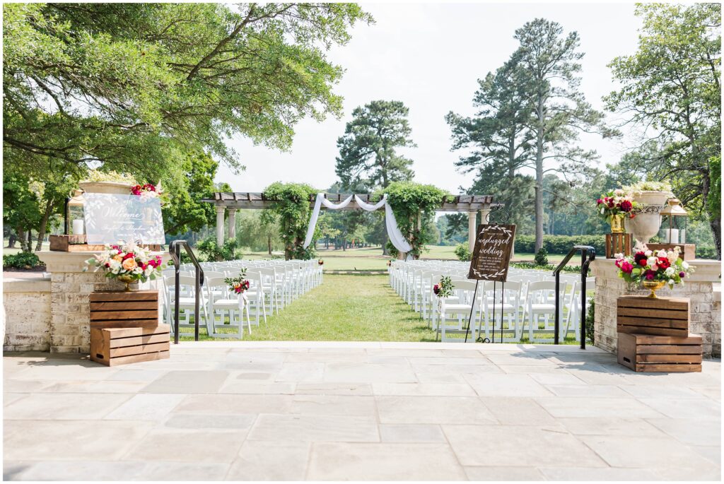 ceremony set up outdoors by trellis at Colonial Williamsburg Inn wedding