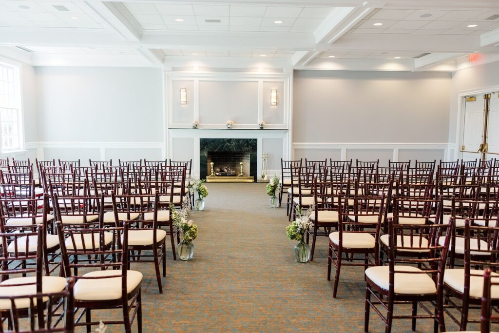chairs set up for indoor ceremony at Ford's Colony Wedding