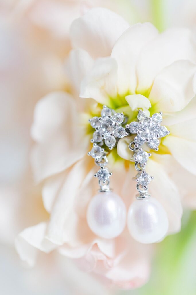 earrings with pearls in bride's bouquet for macro image - please include jewerly in your bridal details checklist