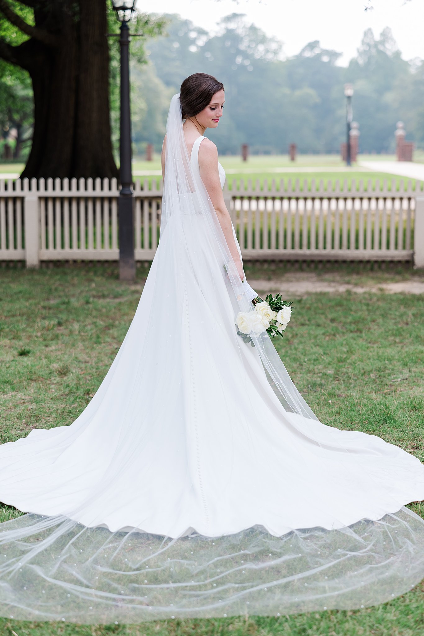bridal portrait in Wren Chapel courtyard on William & Mary campus