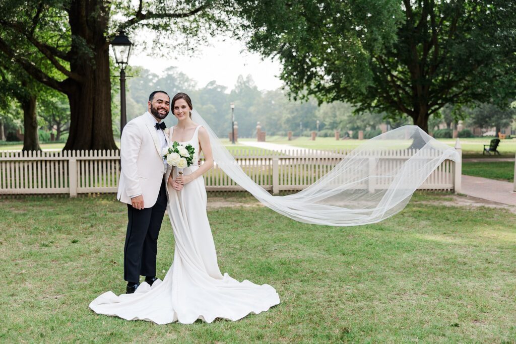 extra long veil for wedding photos helps it to flow in the wind