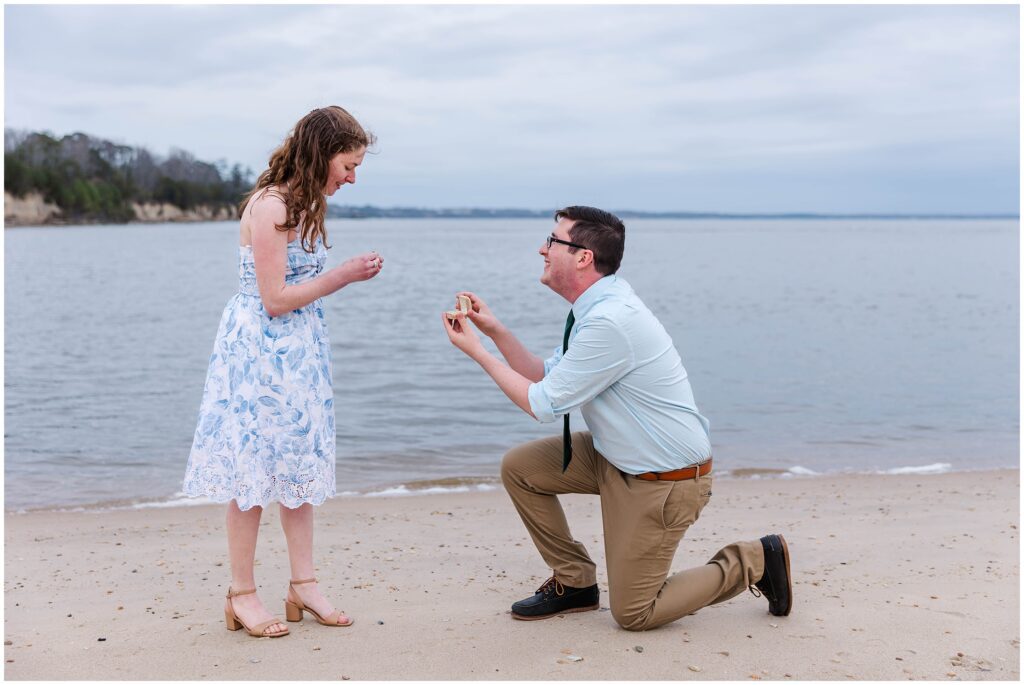 guy gets down on one knee to propose 
