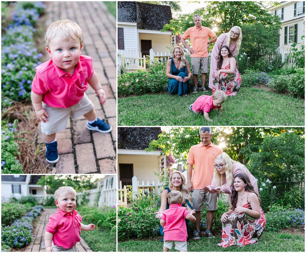 Baby crawling in the grass during a Williamsburg family session while parents laugh nearby.